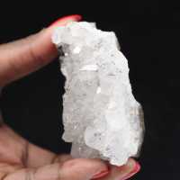 Ruwe kwarts uit Marokko, kristallen met goethietinsluitingen.