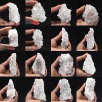 Ruwe kwarts uit Marokko, kristallen met goethietinsluitingen.