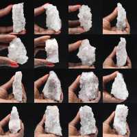 Ruwe kwarts uit Marokko, kristallen met goethietinsluitingen.