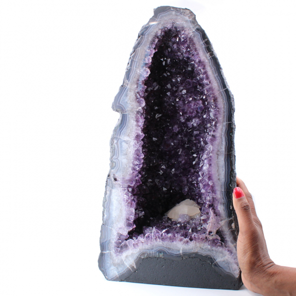 Amethist geode met prachtig calcietkristal