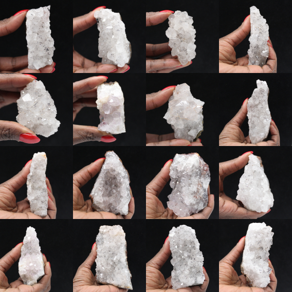 Ruwe kwarts uit Marokko, kristallen met goethietinsluitingen.