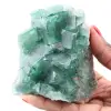 Kubieke kristallen van groen fluoriet op massief fluoriet - 0