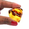 Gepolijste amberkleurige kiezelsteen - 0