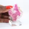 Cobaltocalcite du Congo, cristaux roses en vitrine - 1