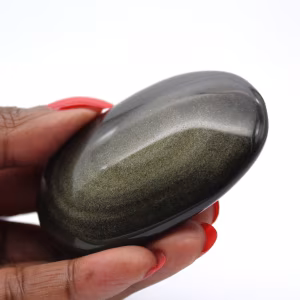 Kei van gouden obsidiaan uit Mexico voor geologische vitrine